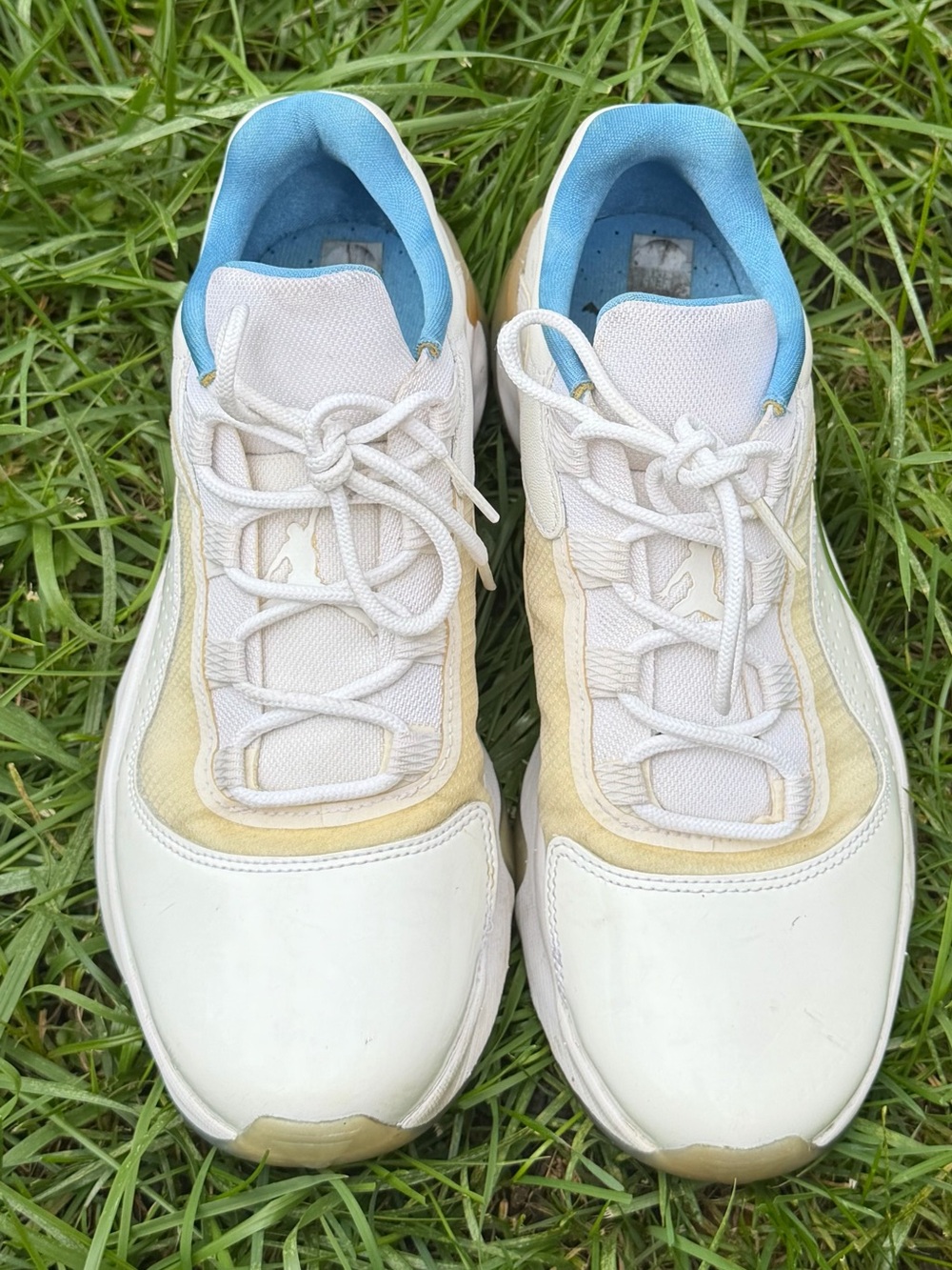 Nike Men's White Athletic Sneakers with Light Blue Lining and Cream Accents